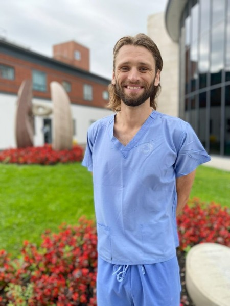 Ironman Gordon Richmond in his hospital scrubs